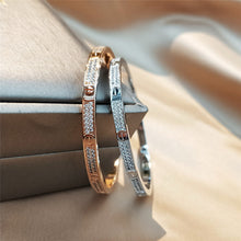 Lade das Bild in den Galerie-Viewer, Eternal Embrace Silver Plated Bangle with Cubic Zirconia Accent
