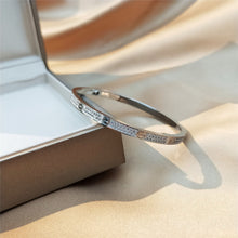 Cargar imagen en el visor de la galería, Eternal Embrace Silver Plated Bangle with Cubic Zirconia Accent
